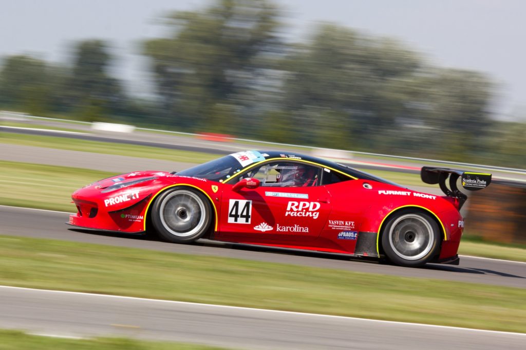 Red sports car on a racing track