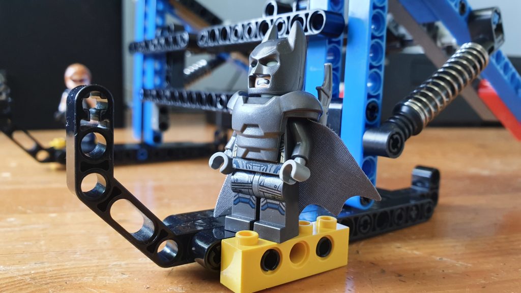 Mini Batman guarding my laptop stand made out of Lego