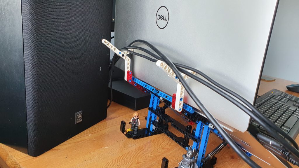 The cable tidy for my laptop stand made out of Lego